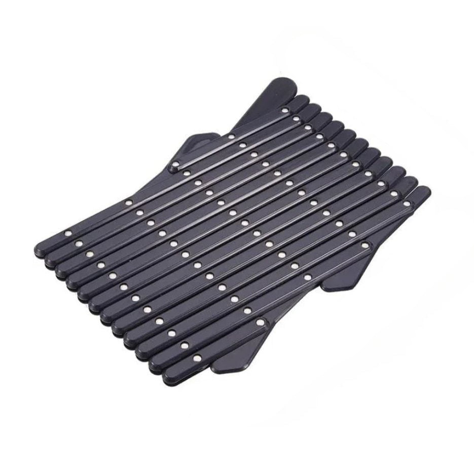 The large size variant of the black retractable car window pet barrier shown in its fully folded storage state.