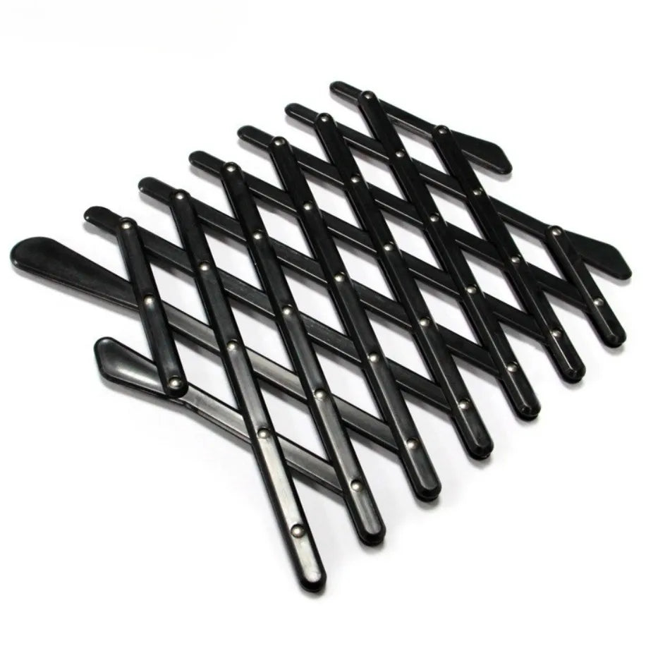 A black, expandable concertina lattice pet barrier for a vehicle window displayed on a white background.