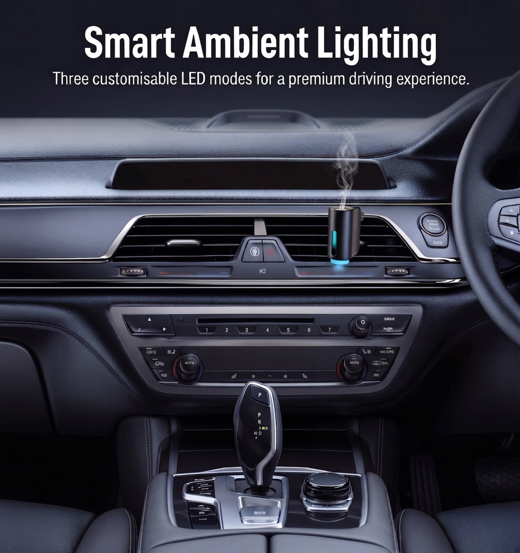 Smart car diffuser plugged into a vehicle air vent, demonstrating customisable ambient LED lighting in a premium dark car interior.