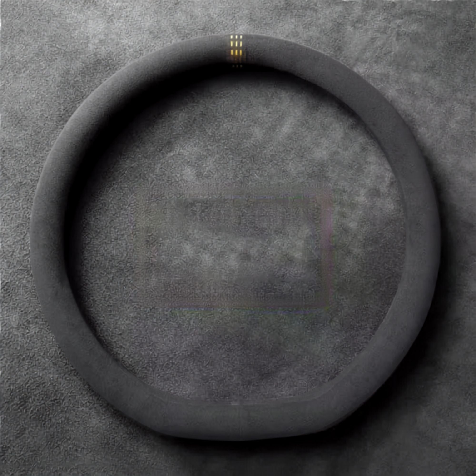 Flat-bottom Steering Wheel Cover and Non-Slip Suede Grip Cover in black suede with yellow stitching, laid flat to show the D-shaped fit.