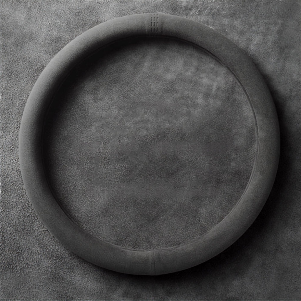 Round-style Steering Wheel Cover and Non-Slip Suede Grip Cover in black suede, laid flat to show the fitted shape.