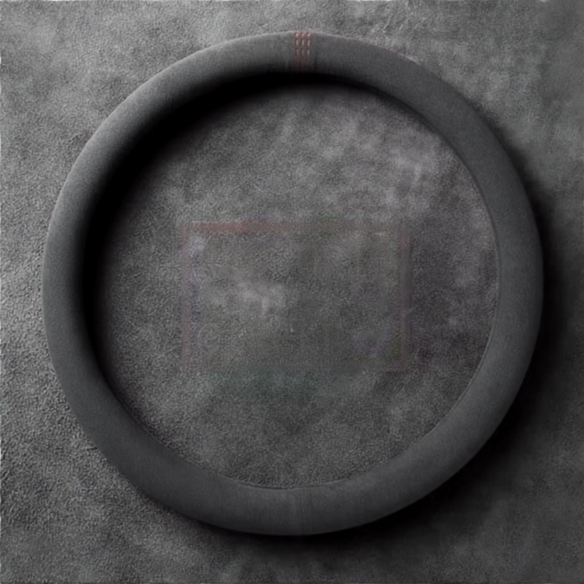 Round-style Steering Wheel Cover and Non-Slip Suede Grip Cover in black suede with red stitching, laid flat to show the fitted shape.