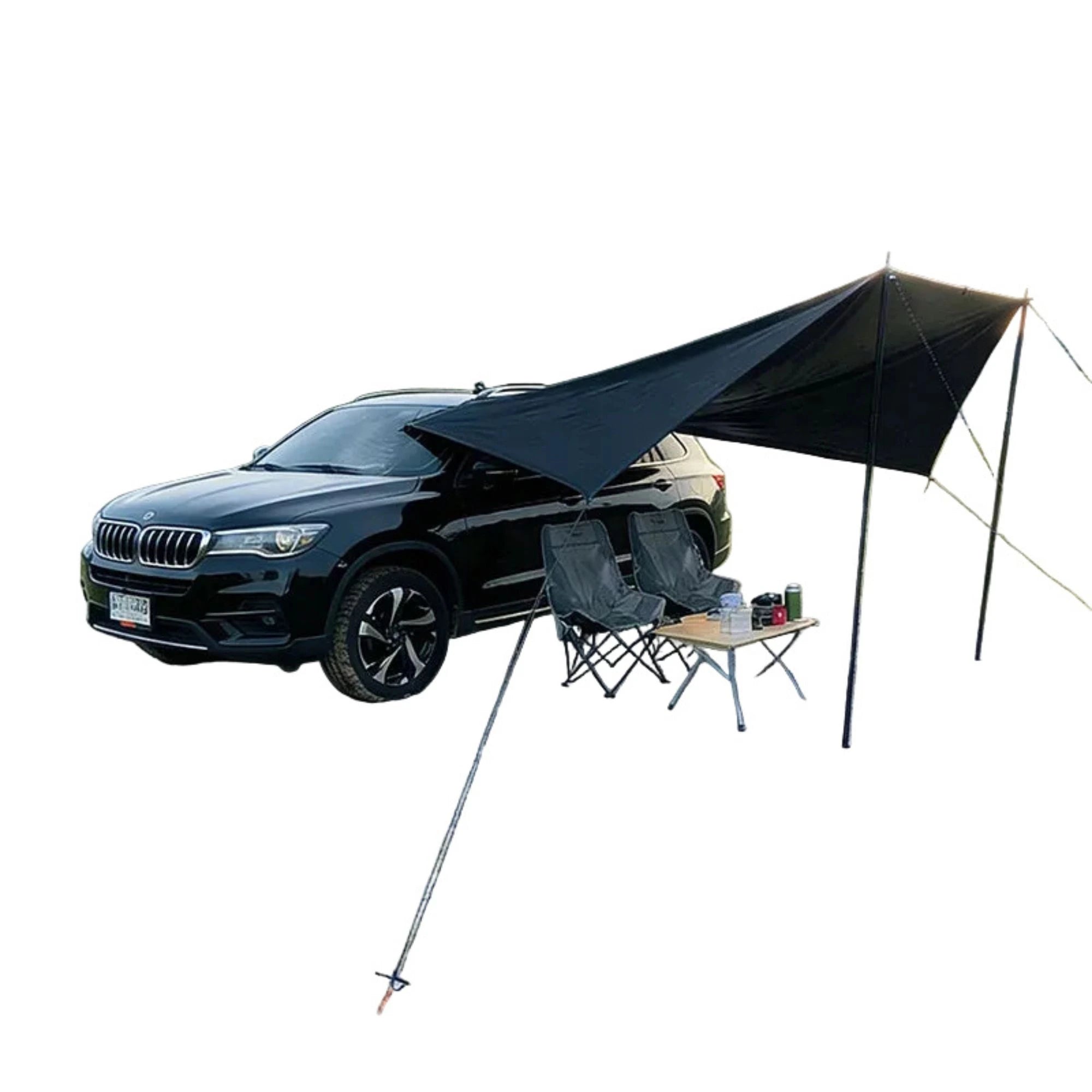 Black waterproof car side awning tent set up on a vehicle, supported by two poles and secured with guy ropes.