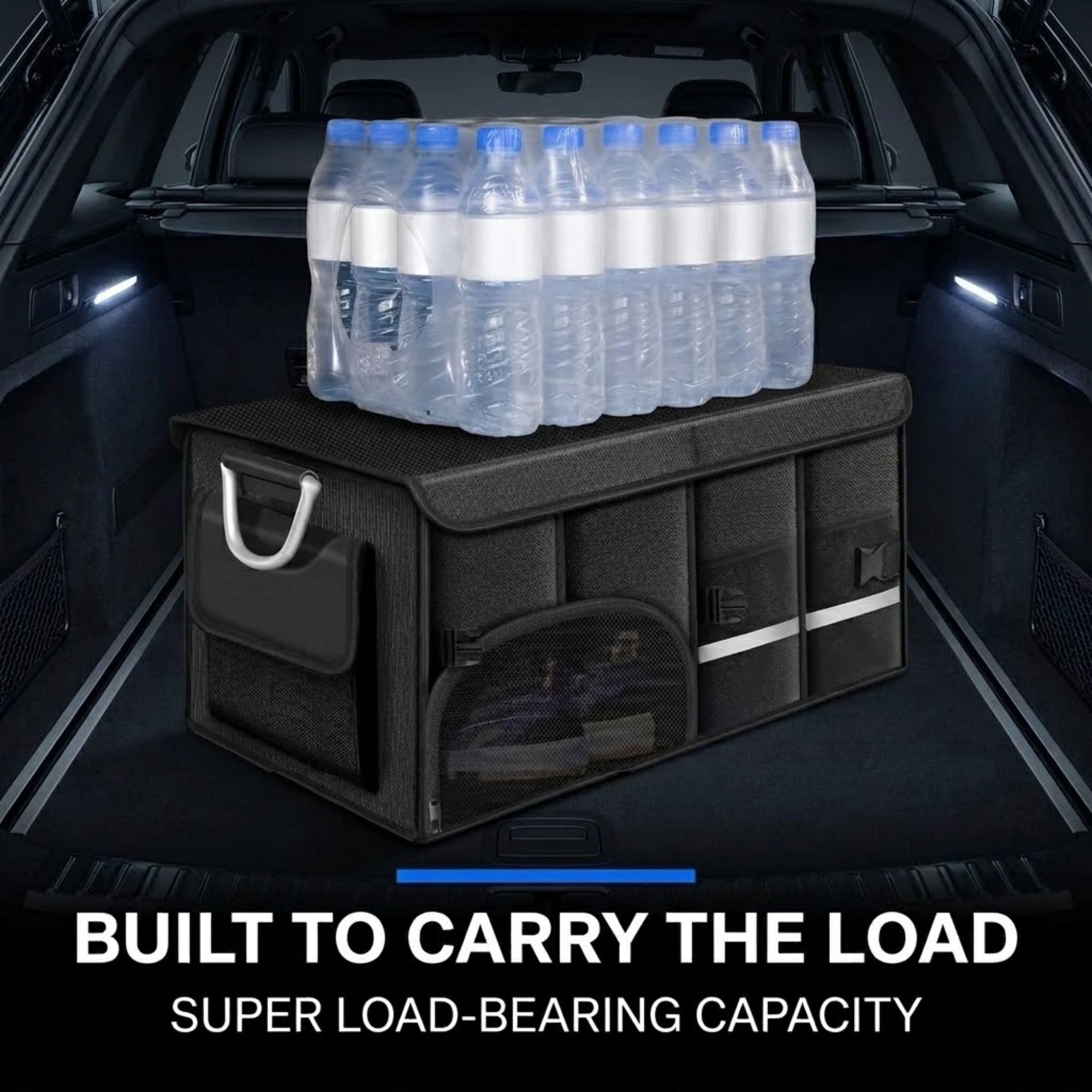 A black expandable car trunk organizer box with a handle and front storage pocket, shown inside a car trunk with bottled water placed on top to demonstrate load-bearing capacity. Text at the bottom reads 'BUILT TO CARRY THE LOAD' and 'SUPER LOAD-BEARING CAPACITY'.