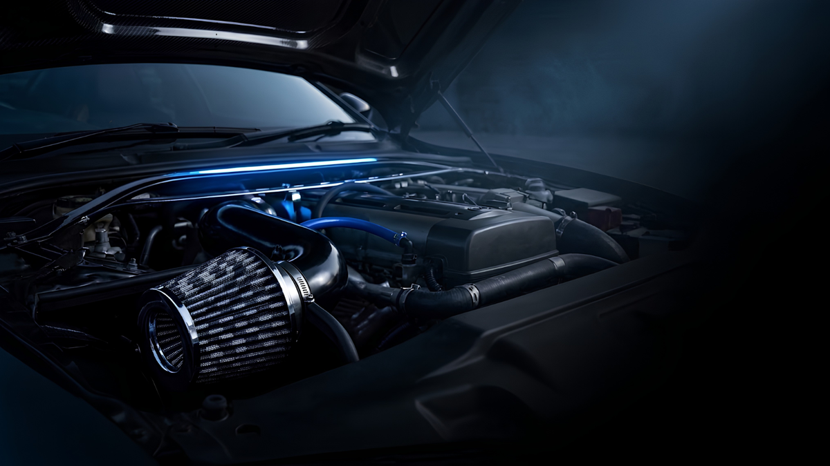 Cold Air Intake Kit installed in engine bay. black cold air exhaust intake kit setup.
